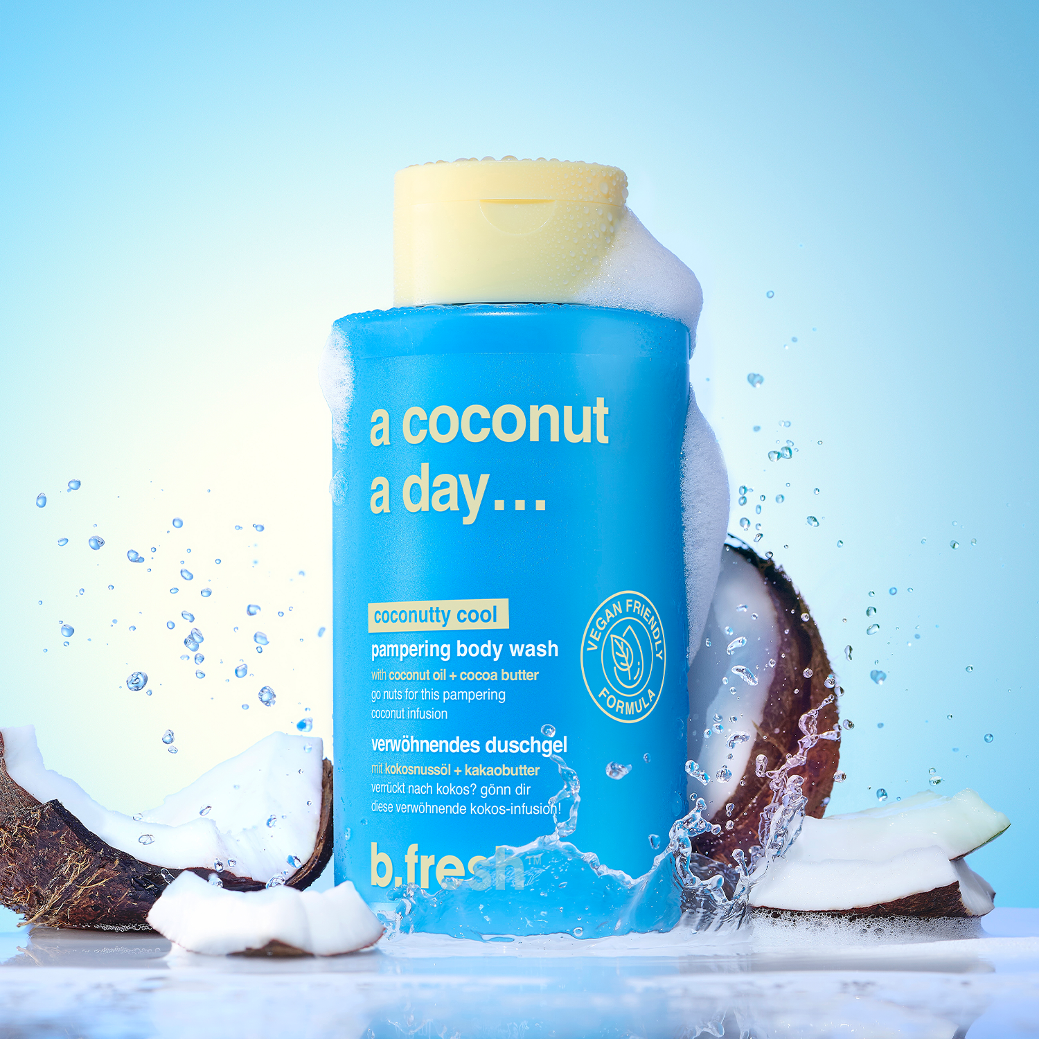 bottle of a coconut a day body wash next to a coconut